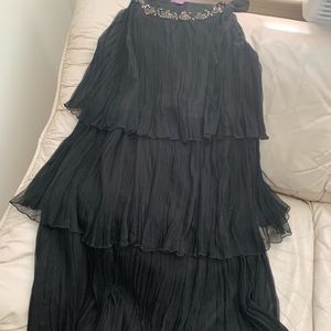 Black cocktail dress—fun and swinging.  Jeweled neckline. Size 8.